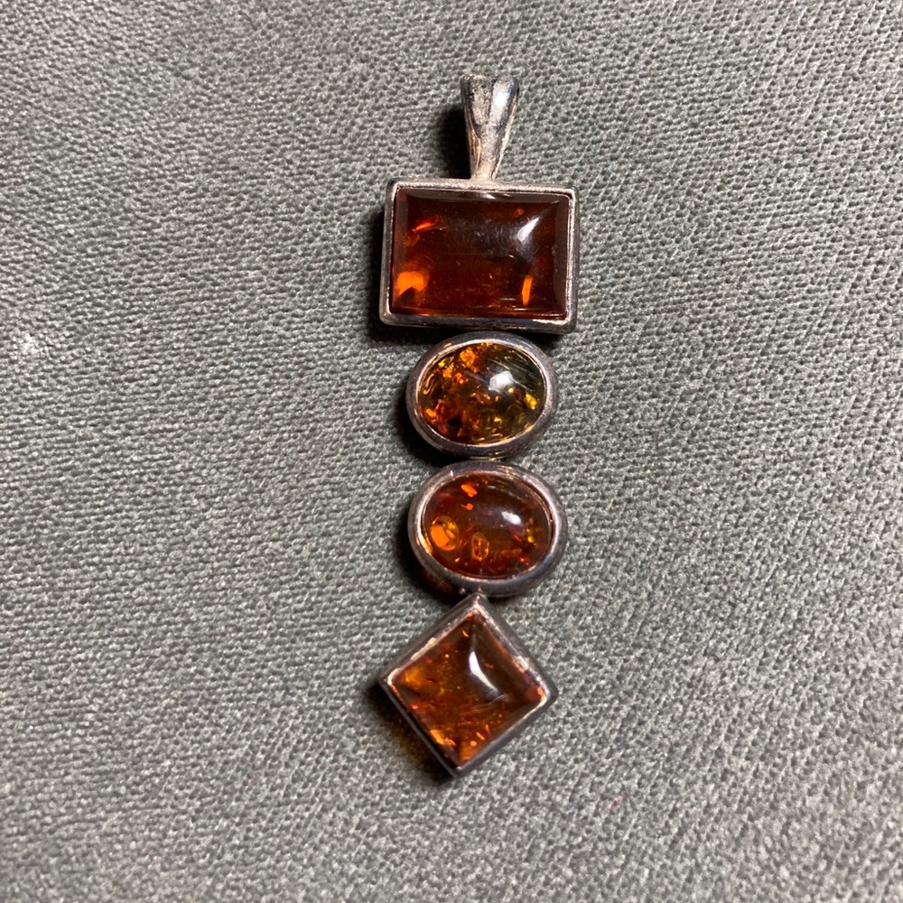 Amber pendant set in .925 silver